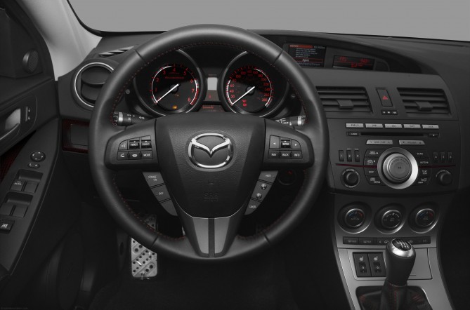 2010-Mazda-MAZDASPEED3-Coupe-Hatchback-Sport-4dr-Hatchback-Interior-Driver-Side.png.jpg