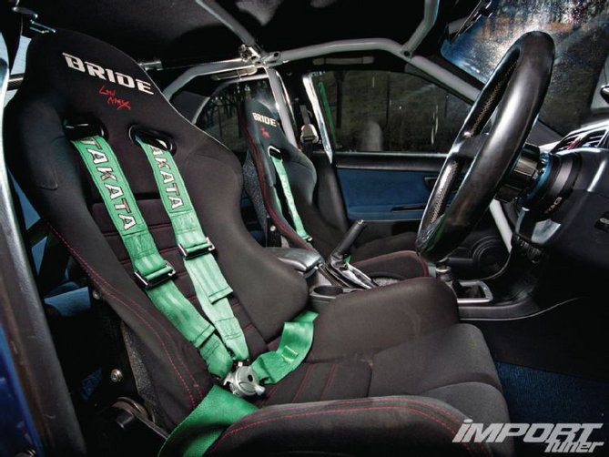 impp-1202-08-o+2002-subaru-wrx+bride-seats.jpg